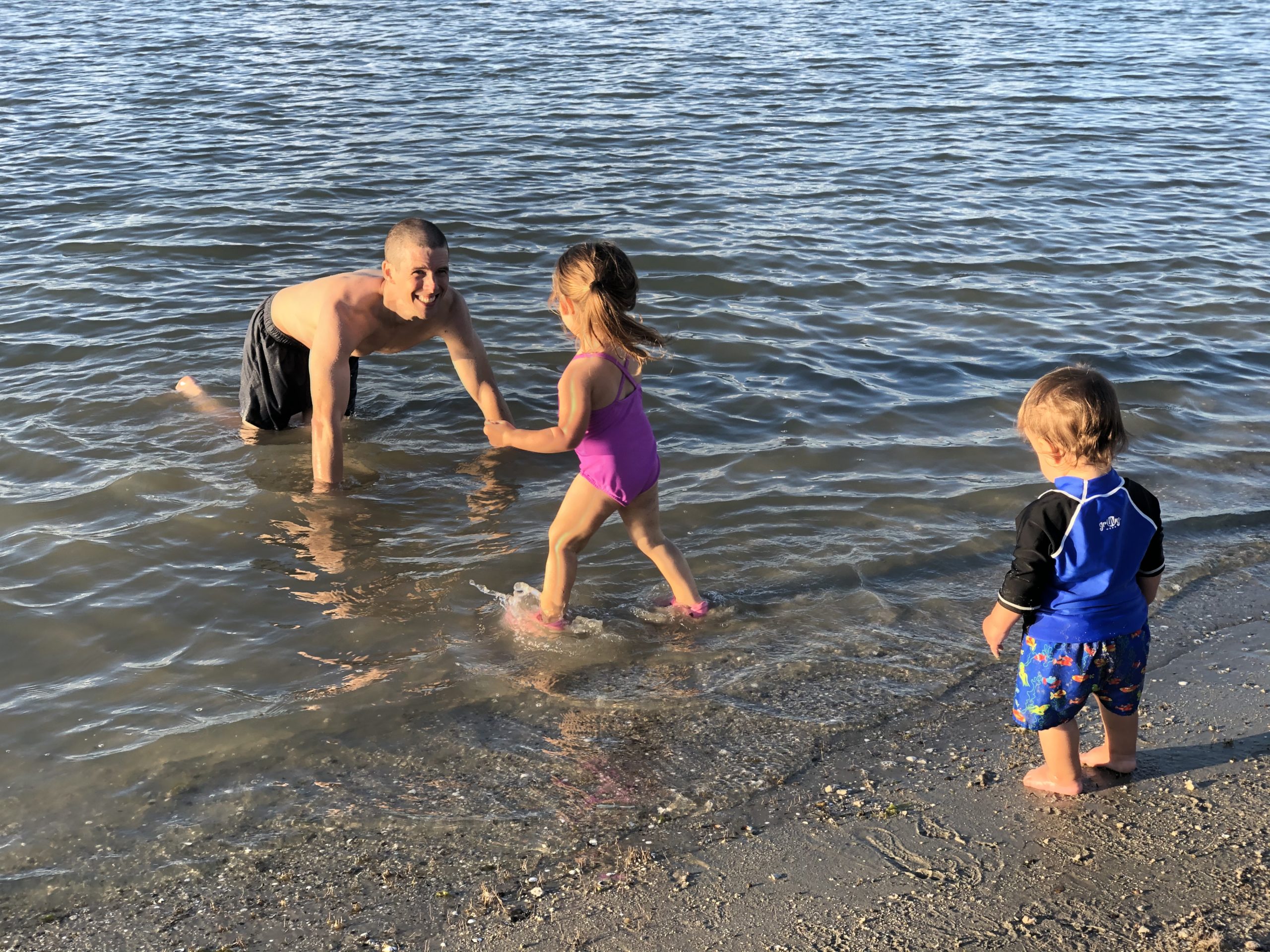 John and the kids playing in the lake