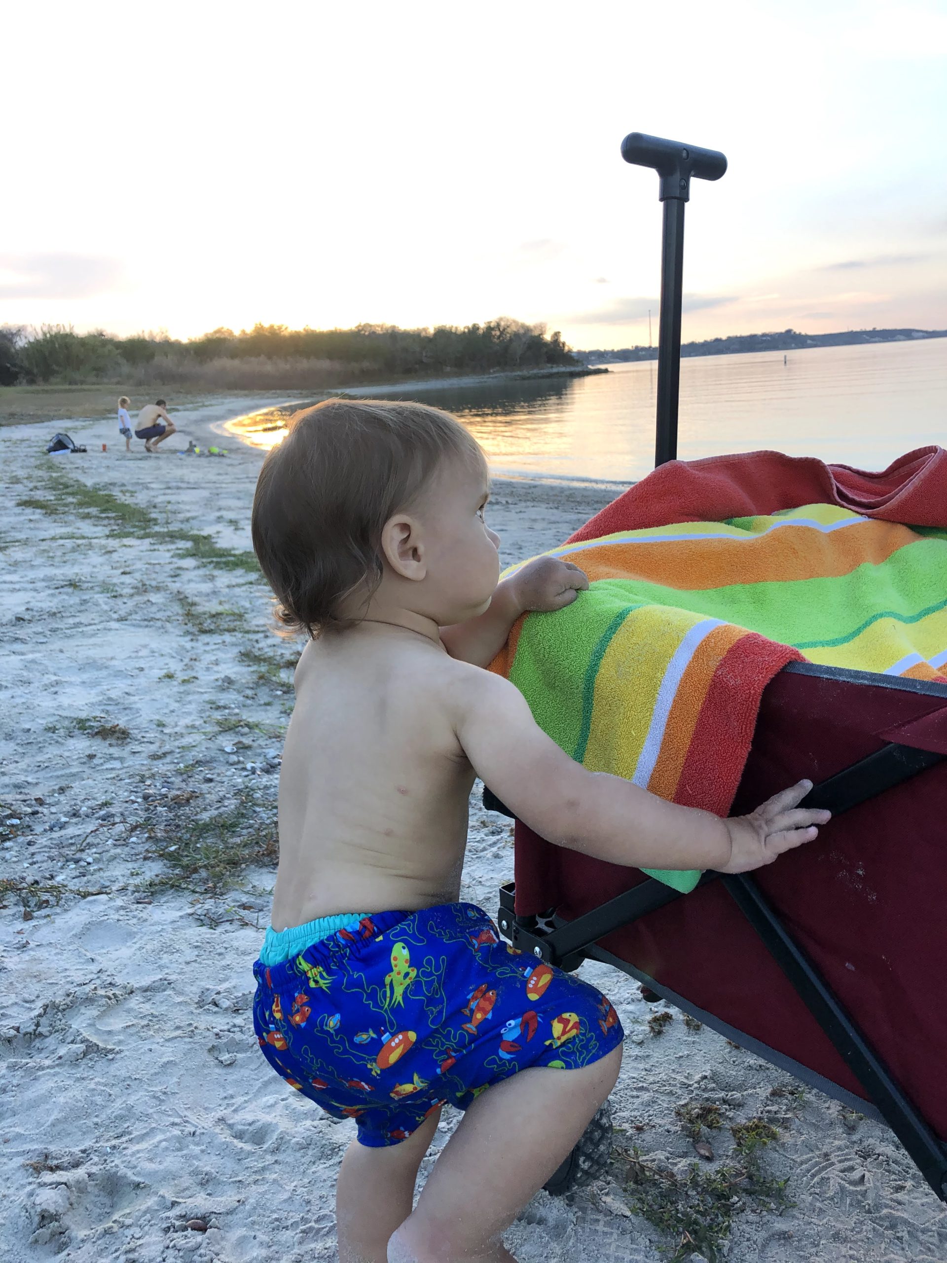 Toddler W hanging at the beach